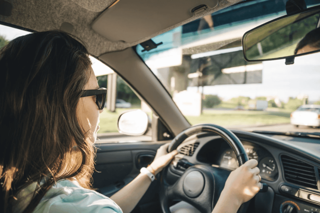 Close up of woman driving