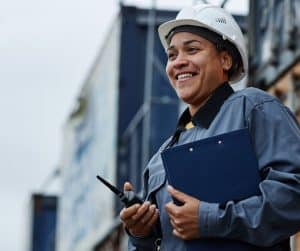 a construction worker in front of a building